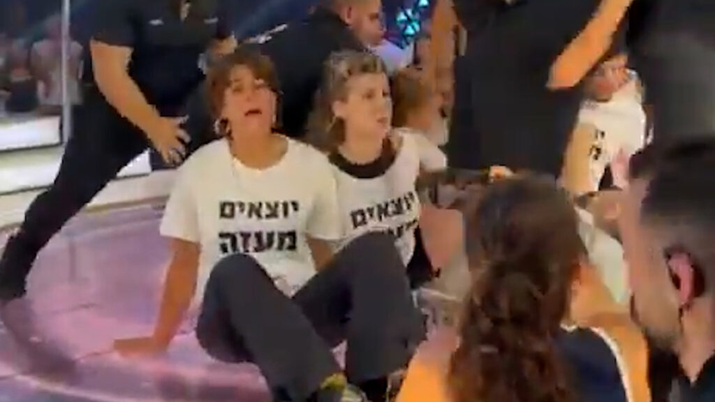 Antiwar activists storm Big Brother stage to disrupt broadcast in Israel | Israel-Palestine conflict