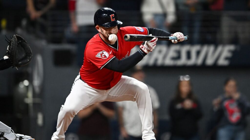 Guardians' David Fry carted off after 99 mph pitch hits face