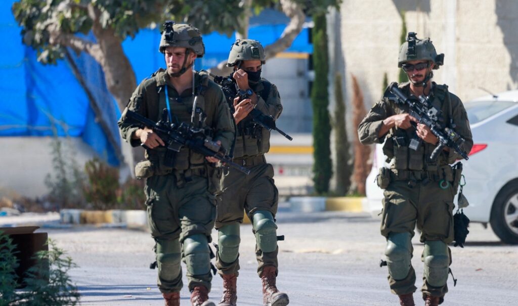 Israeli forces arrest young Palestinian woman during raid in Hebron | Occupied West Bank