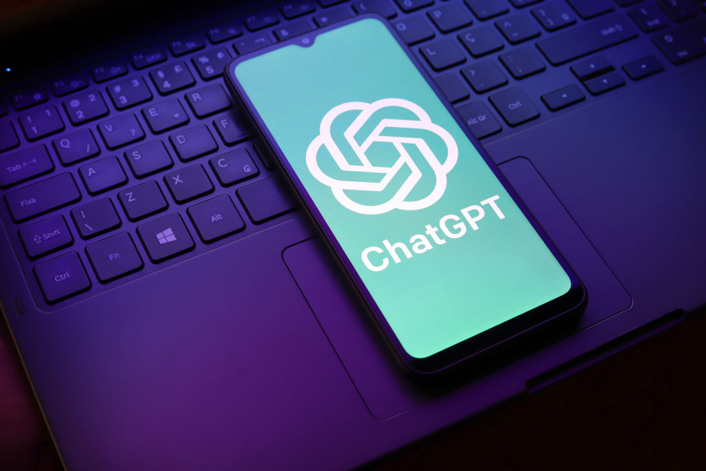 Everything you need to know about the AI chatbot The ChatGPT logo appears on a smartphone screen