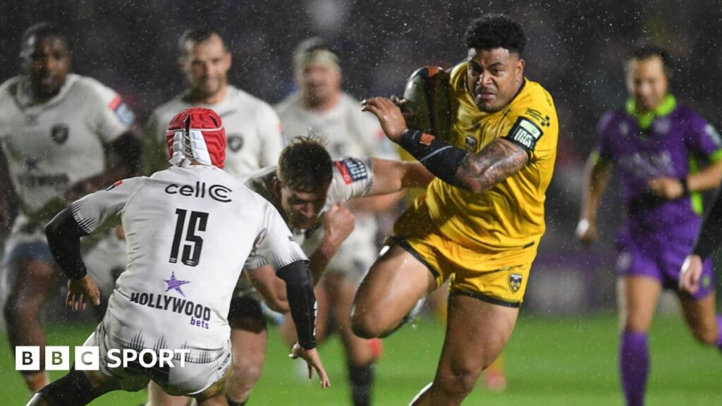 Dragons centre Fetuli Paea carries in the build-up to Angus O'Brien's try against Sharks